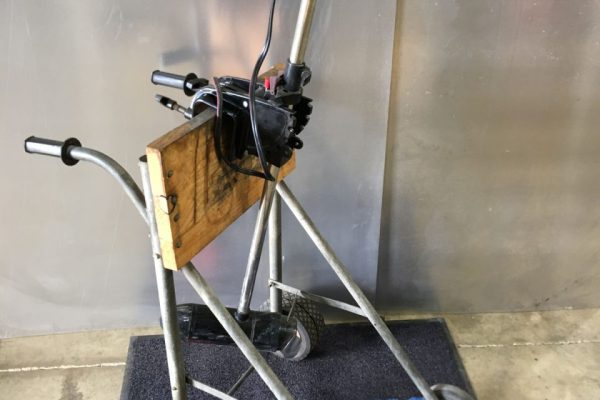 the side of a sports fisher electric motor on a mobile motor stand