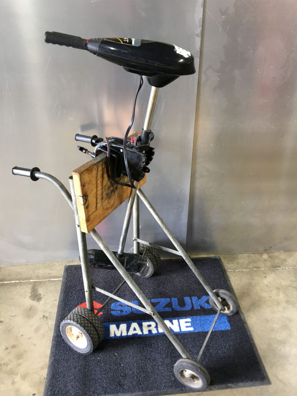 the side of a sports fisher electric motor on a mobile motor stand